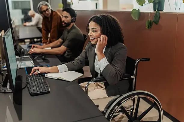 Customer service agent with a headset helping a customer